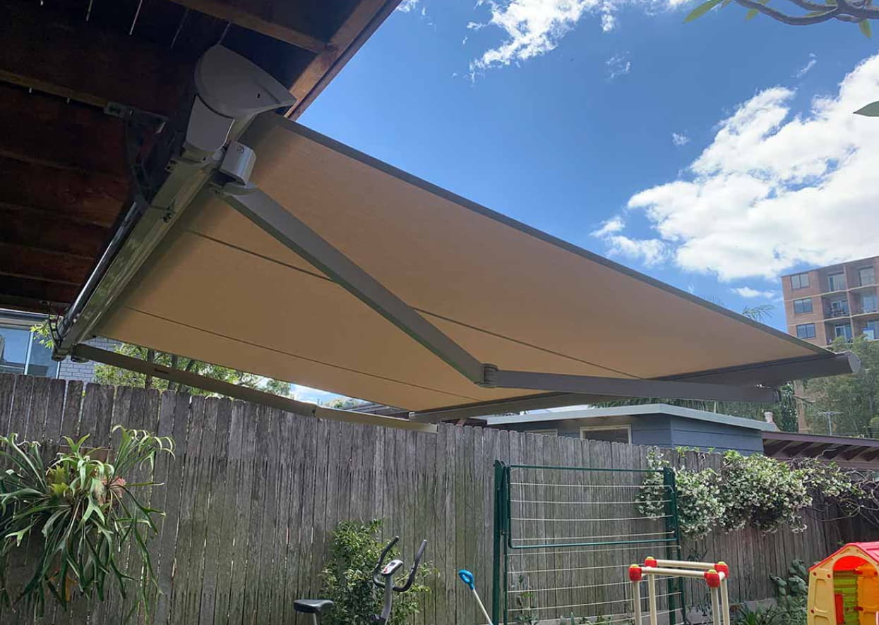 fixed-arm outdoor awning blind