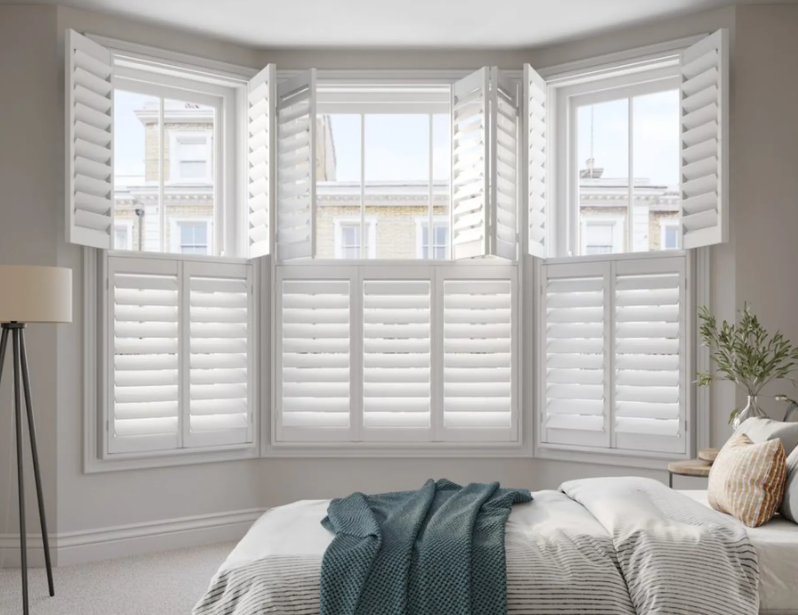 Elevate Your Space: Shutter Blinds vs. Traditional Window Dressings